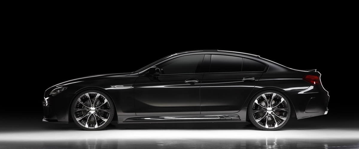 WALD BMW F06 6 Series Gran Coupe full side profile showing WALD Black Bison side skirts and lowered stance