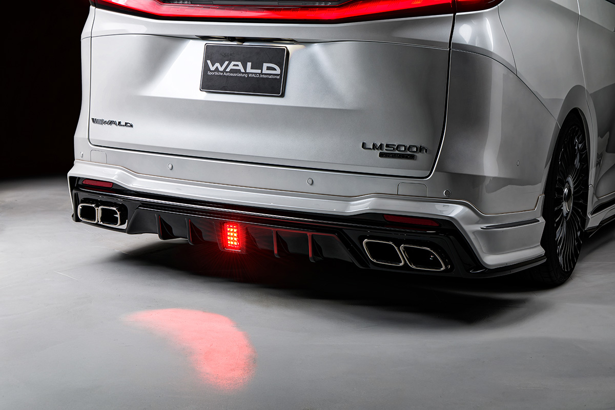 WALD Lexus LM500h rear skirt detail — illuminated LED lamp LEDBGL175 with exhaust tips