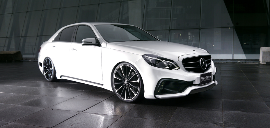 WALD Black Bison E-Class W212 front three-quarter view showing Mercedes W212 body kit and forged wheels