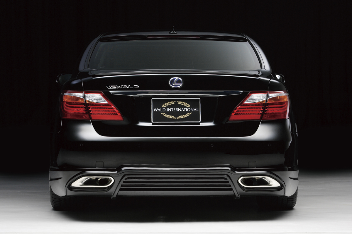 WALD Executive Line Lexus LS600h rear studio view with WALD rear skirt, boot spoiler and stainless steel exhaust finishers