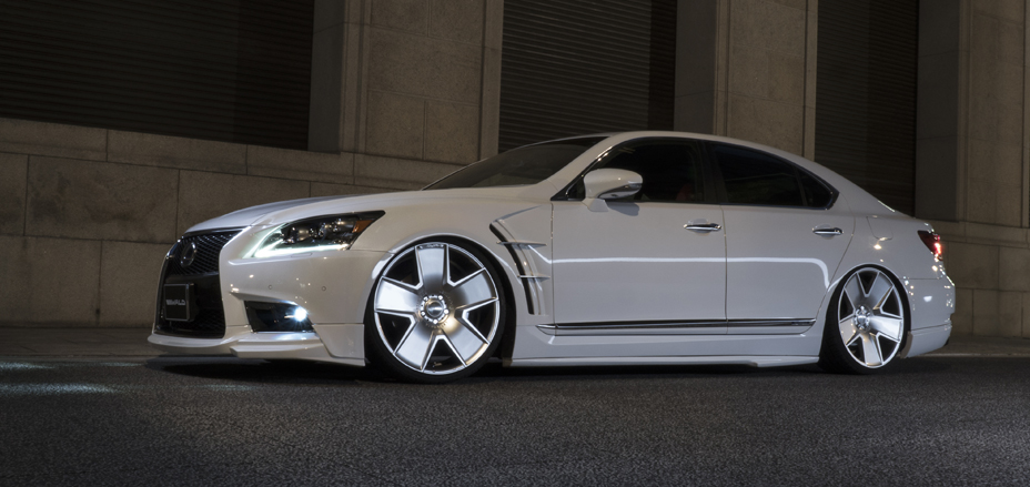 WALD Executive Line Lexus LS460 F SPORT in white with WALD front spoiler, side skirts and sports fender ducts