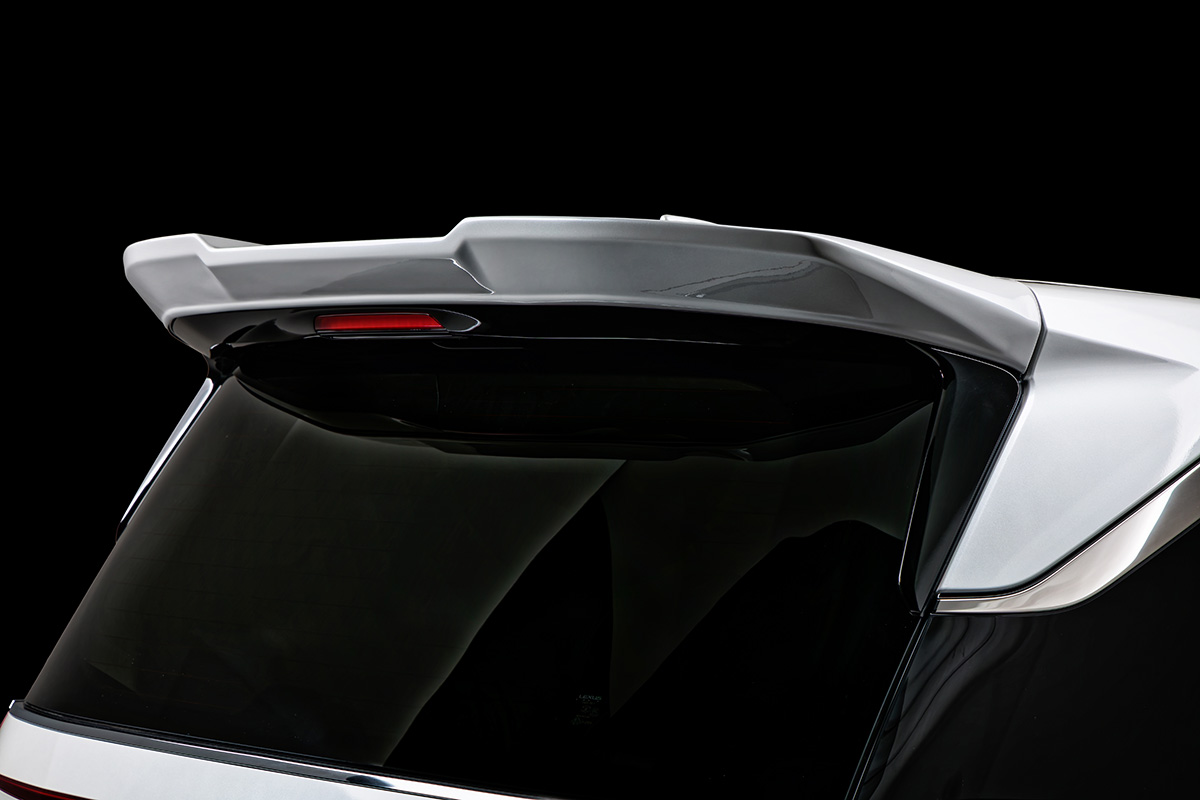 WALD Lexus LM500h TAWH15W rear wing detail — ABS roof wing with integrated LED brake lamp on white Lexus LM500h