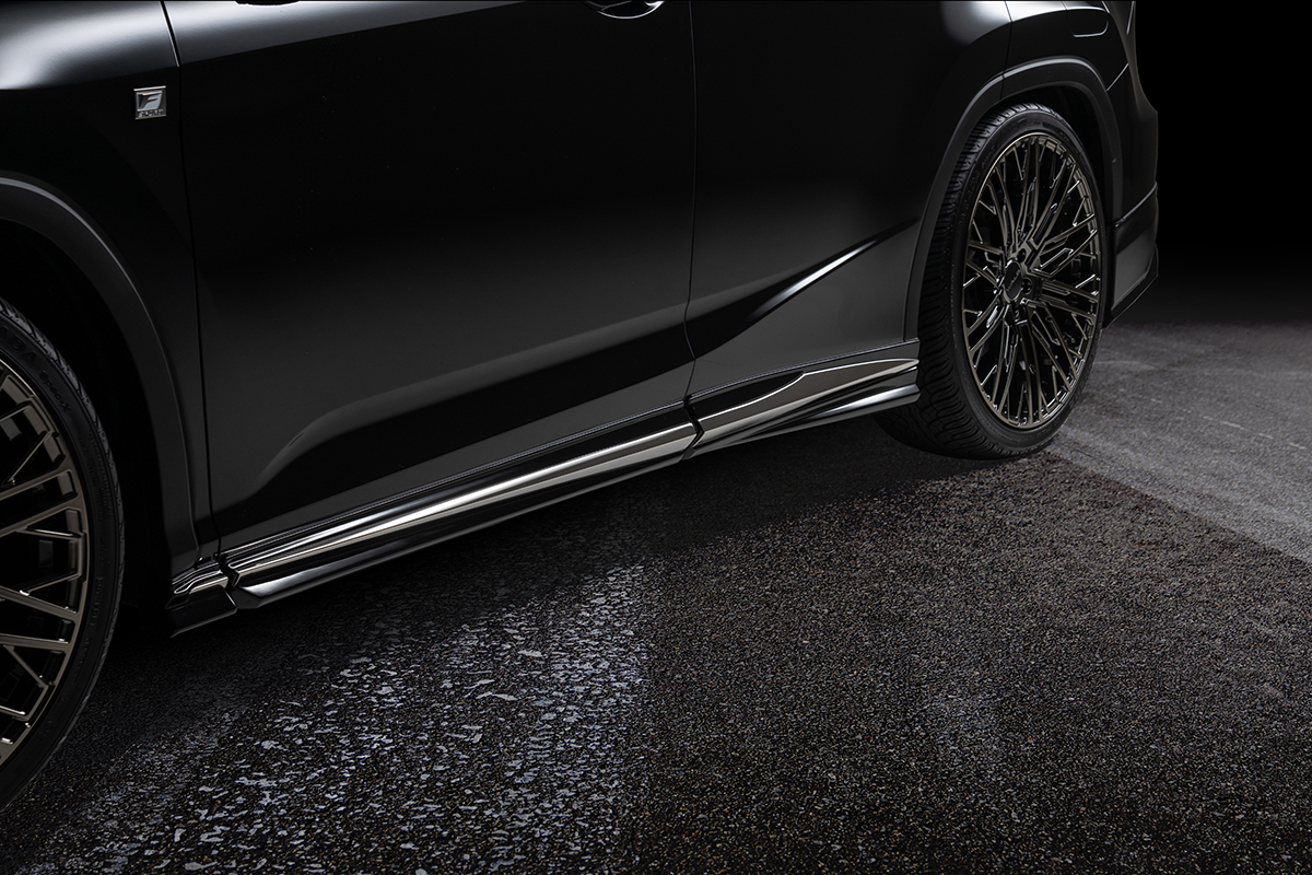 WALD Lexus RX300 side skirt detail — ABS side skirt with stainless steel trim on black Lexus RX300 F SPORT