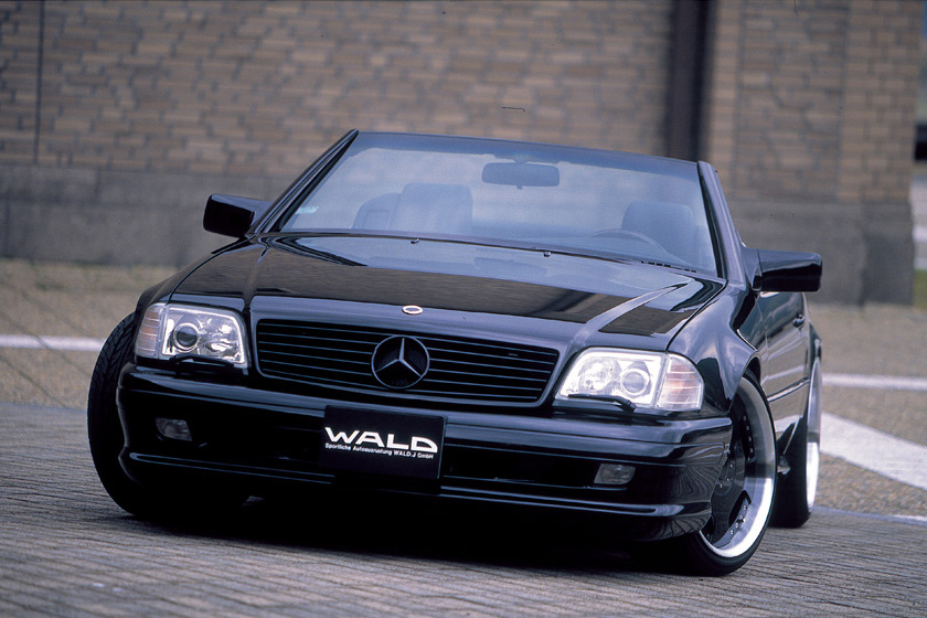 WALD Mercedes SL R129 roadster head-on front view with roof down and deep-dish WALD wheels