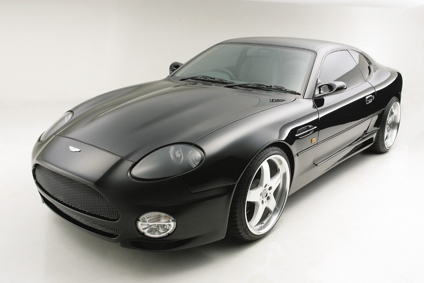 WALD Aston Martin DB7 Sports Line body kit — black DB7 front three-quarter view with WALD front bumper spoiler