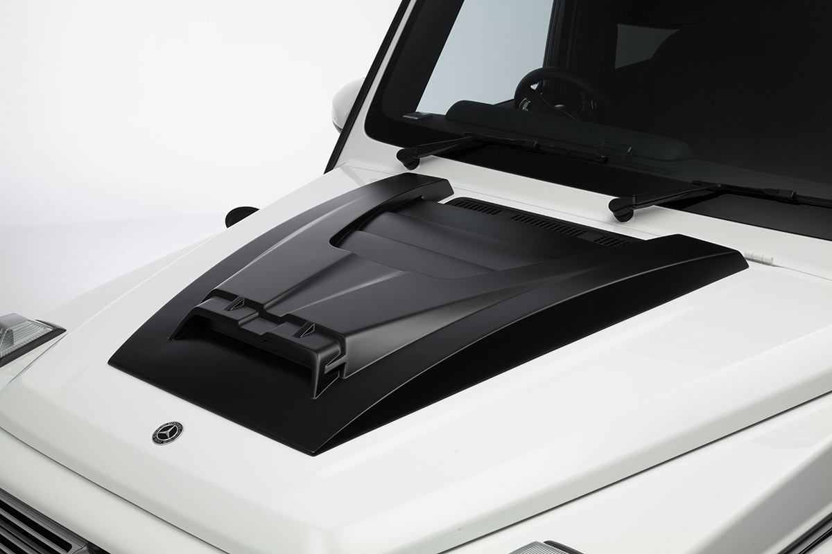 WALD Sports Line G-Class W463A bonnet scoop cover detail — sculpted bonnet scoop on white G-Class bonnet