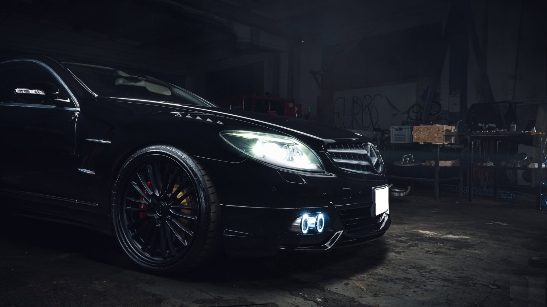 Mercedes-Benz CL C216 WALD front spoiler detail with fog lamps and multi-spoke WALD wheel