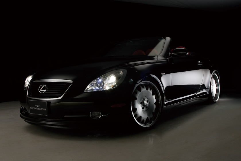 WALD Executive Line Lexus SC430 UZZ40 — black SC430 front three-quarter studio view with WALD front spoiler