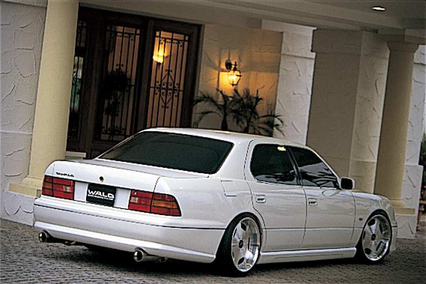 WALD Executive Line V3 Toyota Celsior UCF20/21 M/C before — rear three-quarter view with WALD rear skirt, WALD badging and dual exhaust outlets