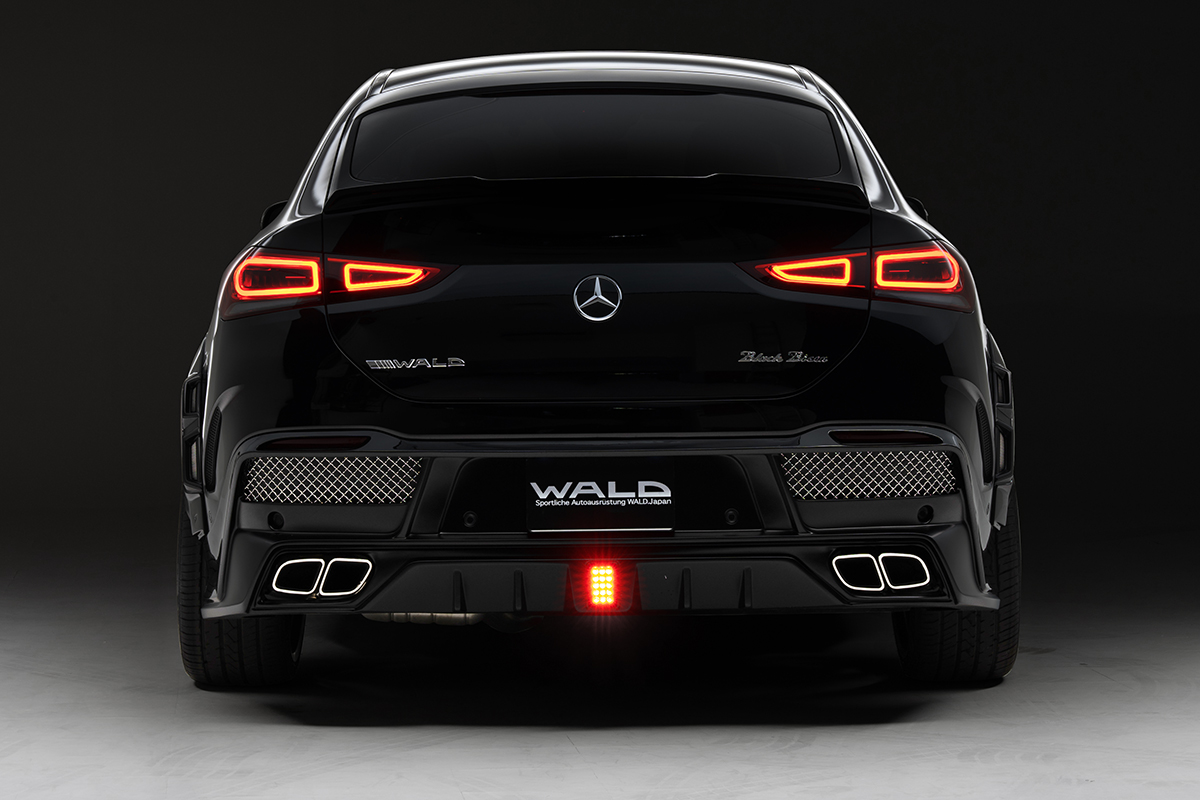 WALD GLE Coupe C167 Black Bison head-on rear view with illuminated LED brake lamp and quad trapezoid exhaust tips