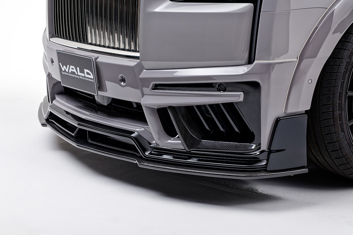 Rolls-Royce Cullinan Series II WALD body kit — close-up of the carbon fibre front lip and bumper ducts