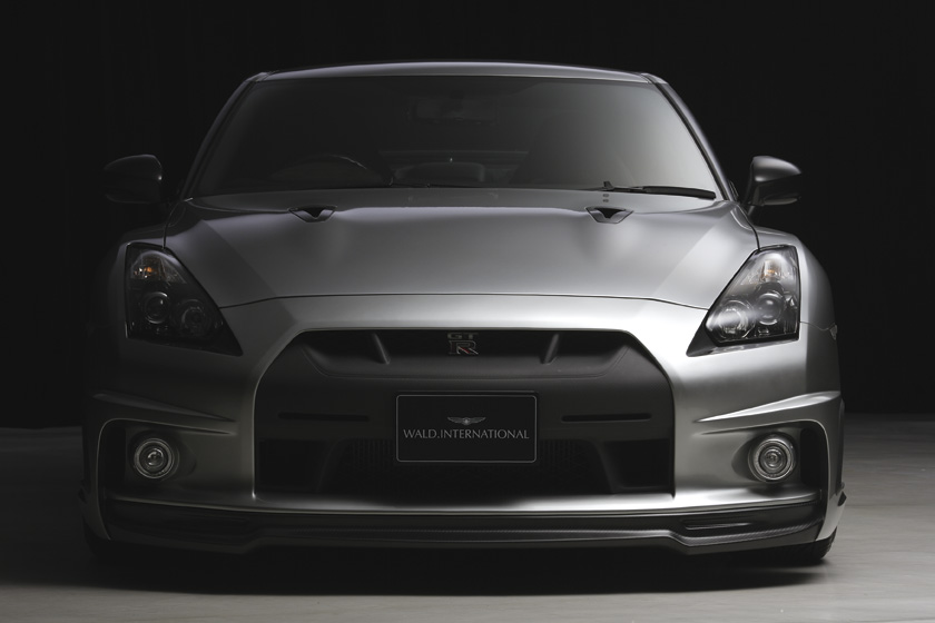 WALD Nissan body kit — silver Nissan GT-R with WALD International front bumper and lower lip spoiler