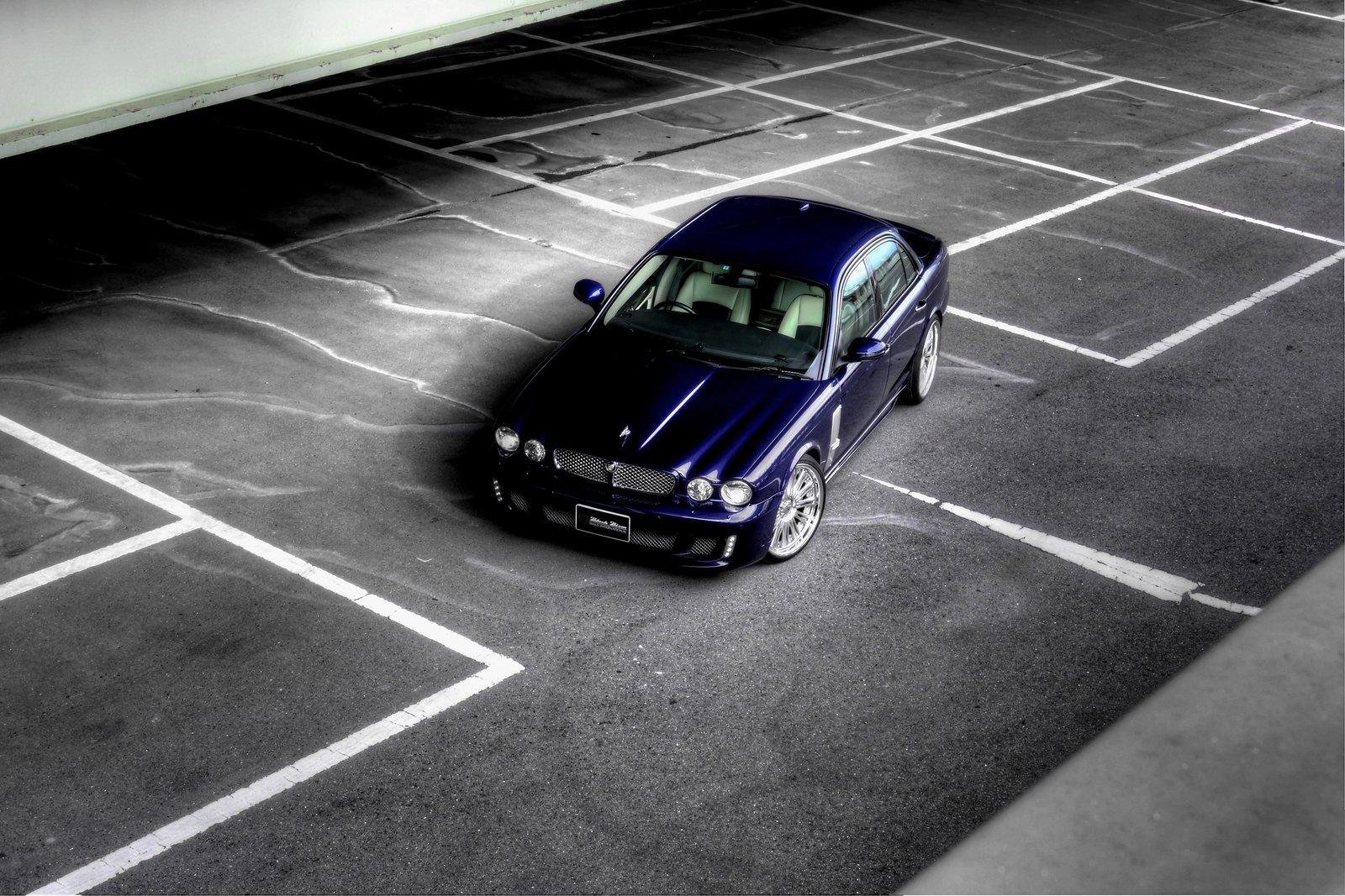 WALD Black Bison Jaguar XJ X350 photographed from above — front view showing bonnet lines and WALD front bumper