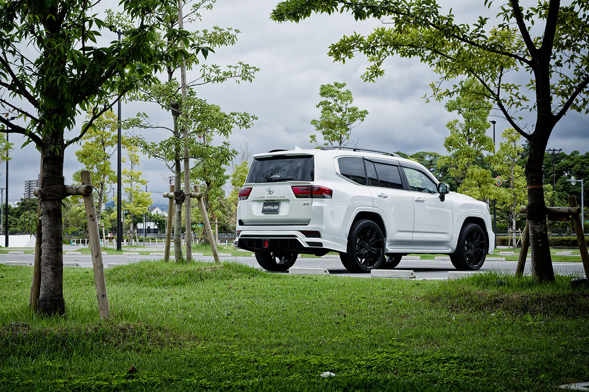 White Toyota Land Cruiser LC300 on WALD ELDORANTE E11C wheels — rear three-quarter view