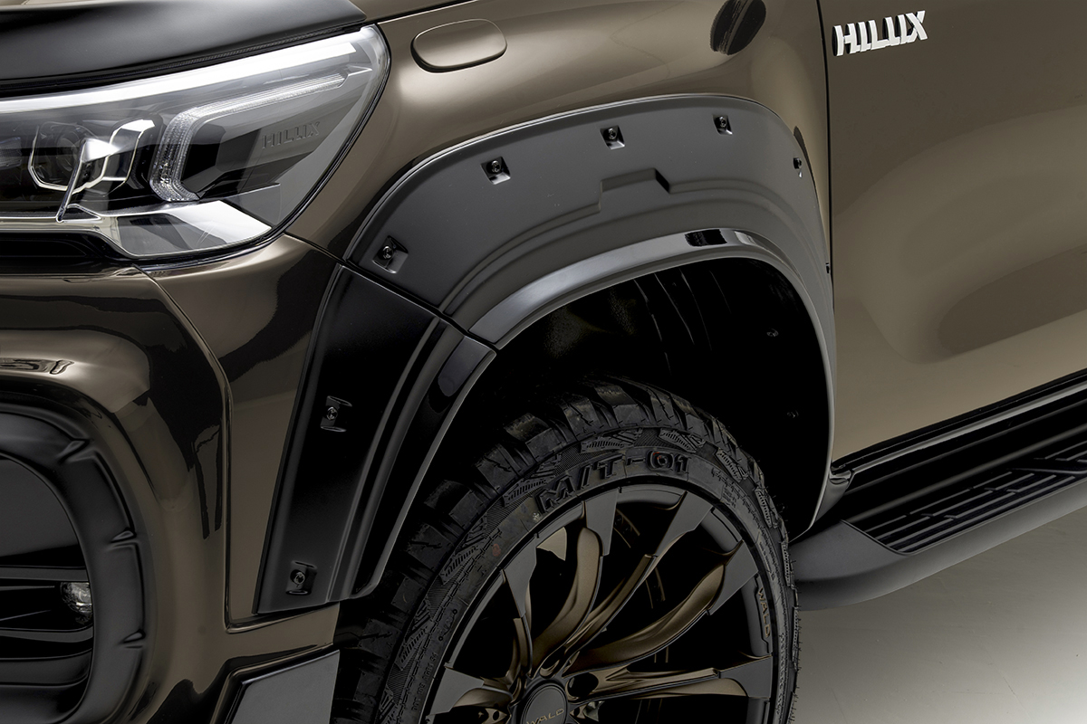 WALD wide arch package and decorative screws detail on the Toyota Hilux GUN125 facelift front wing