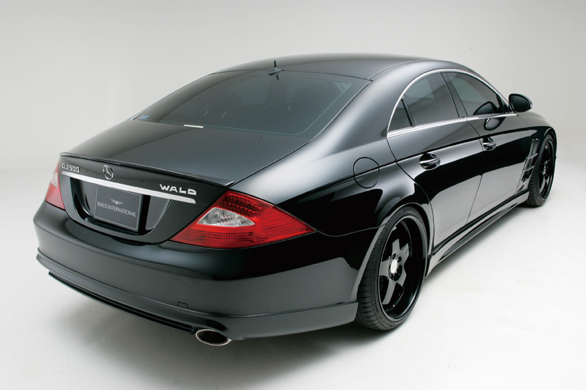 WALD Sports Line Mercedes-Benz CLS-Class C219 black rear studio view with WALD lettering, rear skirt and exhaust tip