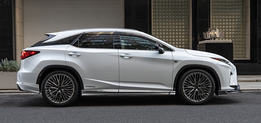 White WALD Lexus RX450h F SPORT full side profile showing side skirts and stainless steel trim