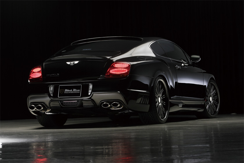 WALD Bentley Continental GT Black Bison Edition 2008–2010 — rear three-quarter studio view with roof spoiler and rear bumper spoiler