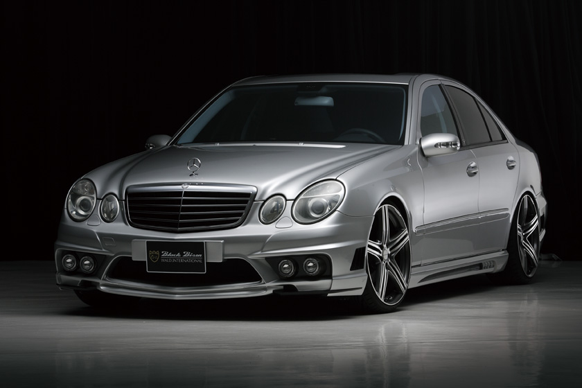 Mercedes-Benz E-Class W211 WALD Black Bison Edition — silver W211 saloon with WALD front bumper spoiler and forged wheels