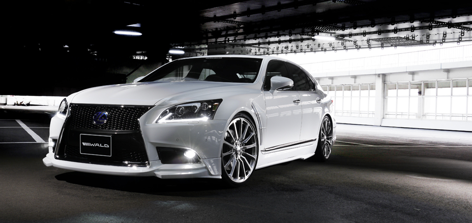 WALD Executive Line Lexus LS460 F SPORT in white with WALD front spoiler under car park lighting