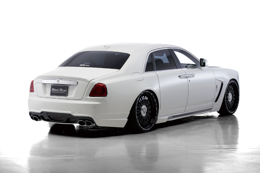 Rolls-Royce Ghost Black Bison Edition — rear three-quarter view with rear bumper spoiler and quad exhaust tips