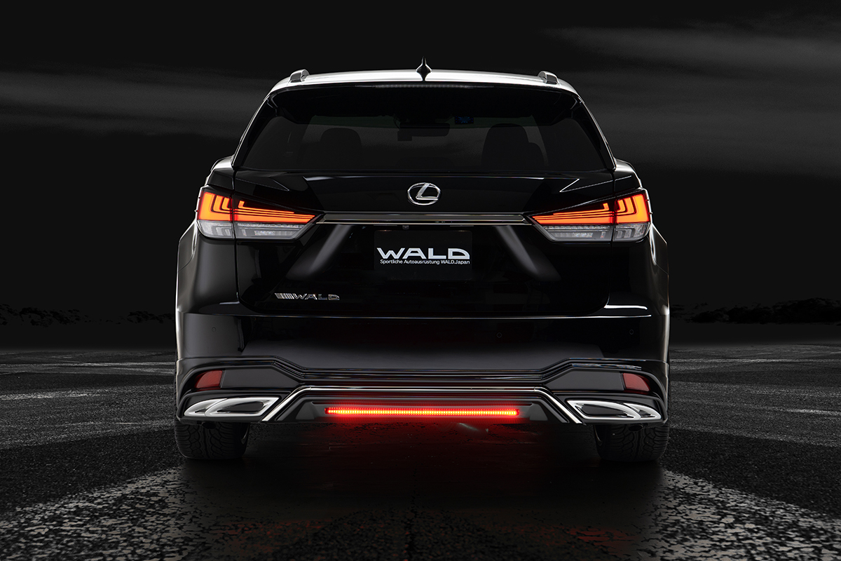 WALD Lexus RX300 rear view at night — WALD rear skirt with illuminated LED lamp LEDBLG1780 and exhaust adaptor