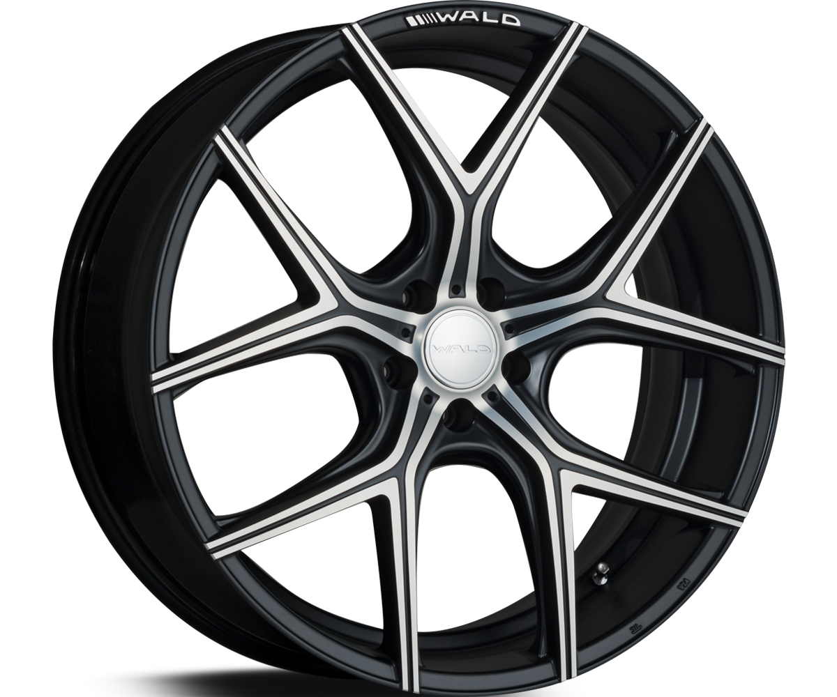 WALD ILLIMA I11C 22 inch 1-piece wheel in Black Polish with the W ARROW logo, studio view