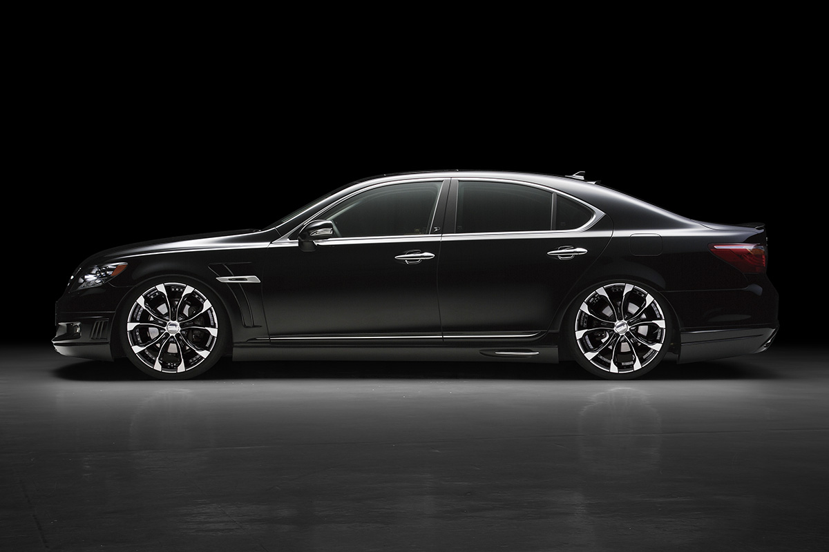 WALD Executive Line Lexus LS600hL side profile in black showing WALD side skirts and sport fender duct