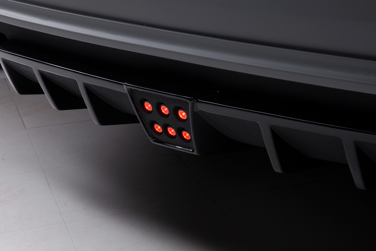 WALD Maserati Quattroporte rear diffuser close-up with illuminated six-point red LED lamp