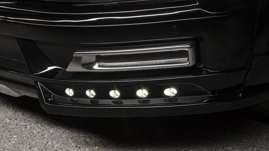 WALD Land Cruiser 200 front spoiler detail — plated garnish and five-point LED bumper lamp