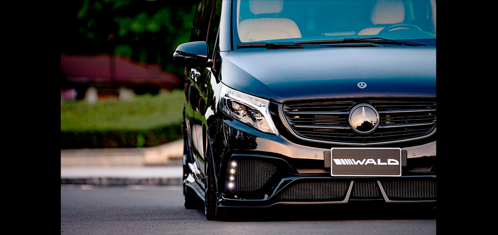 WALD V-Class W447 front bumper spoiler close-up with 4-Dot LED lamp and WALD plate