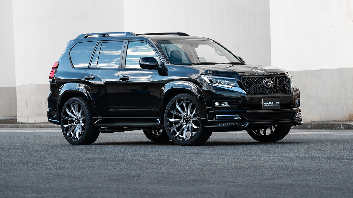 Toyota Land Cruiser Prado with WALD styling on JARRET J11C wheels, front three-quarter view
