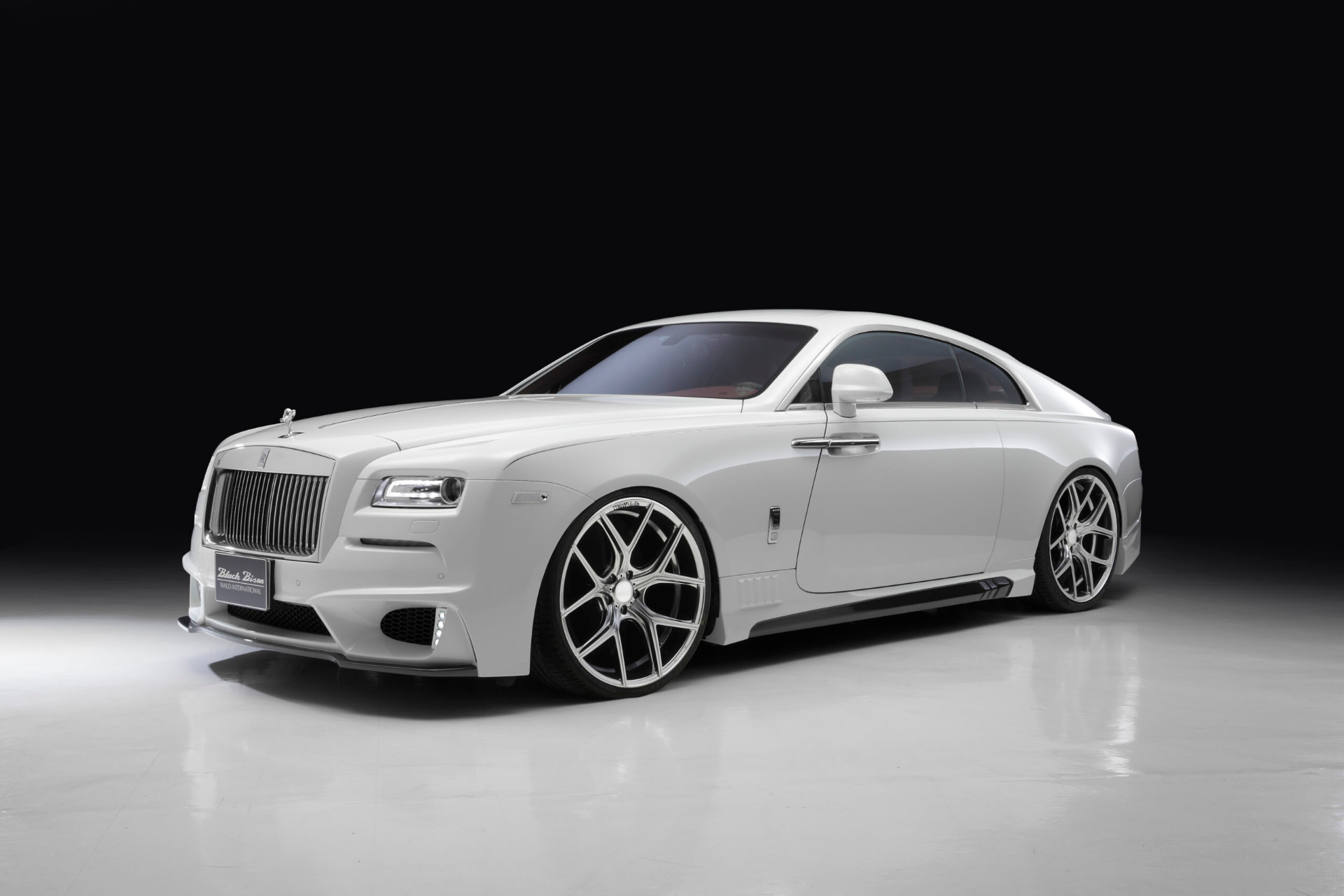 White Rolls-Royce Wraith Black Bison Edition on WALD ILLIMA I11C wheels in a dark studio