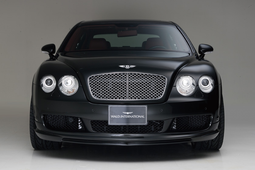 Bentley Continental Flying Spur Executive Line front view showing mesh grille, quad headlamps and WALD front lip spoiler