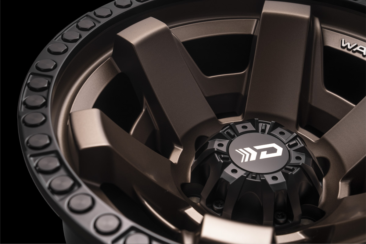 Macro detail of the WALD DS001 centre cap and bolt-style outer rim