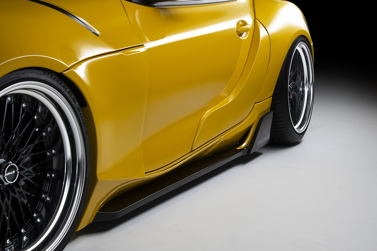 WALD Supra side skirt and rear over fender detail showing +45mm per side widening