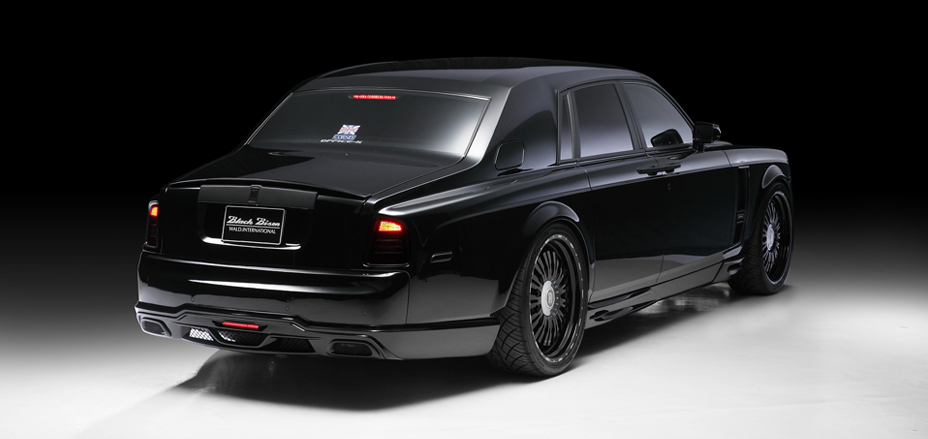 Rolls-Royce Phantom 7 Series II WALD Black Bison Edition — rear three-quarter view with rear bumper spoiler and boot spoiler