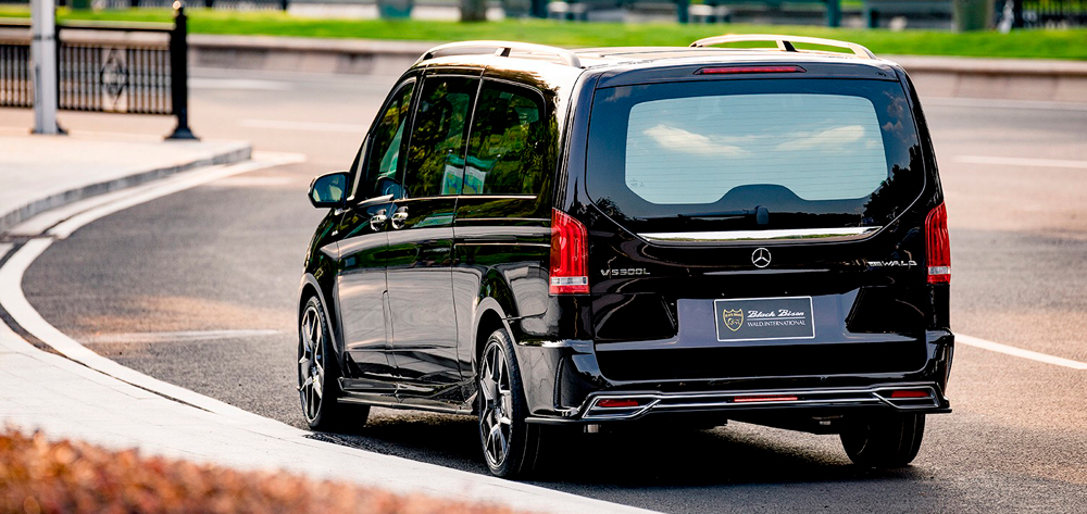 WALD Black Bison Mercedes-Benz V-Class W447 Long rear three-quarter view with rear bumper spoiler and Black Bison plate