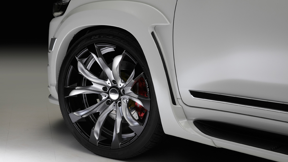 WALD upgrade brake system on Land Cruiser 200 — 8-piston calipers with 405mm discs behind JARRET 24-inch wheel and wide arch