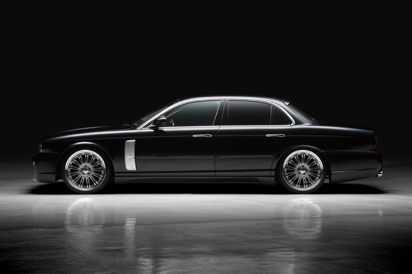 Jaguar XJ X350 WALD Black Bison body kit — side profile showing WALD side skirts and wheels