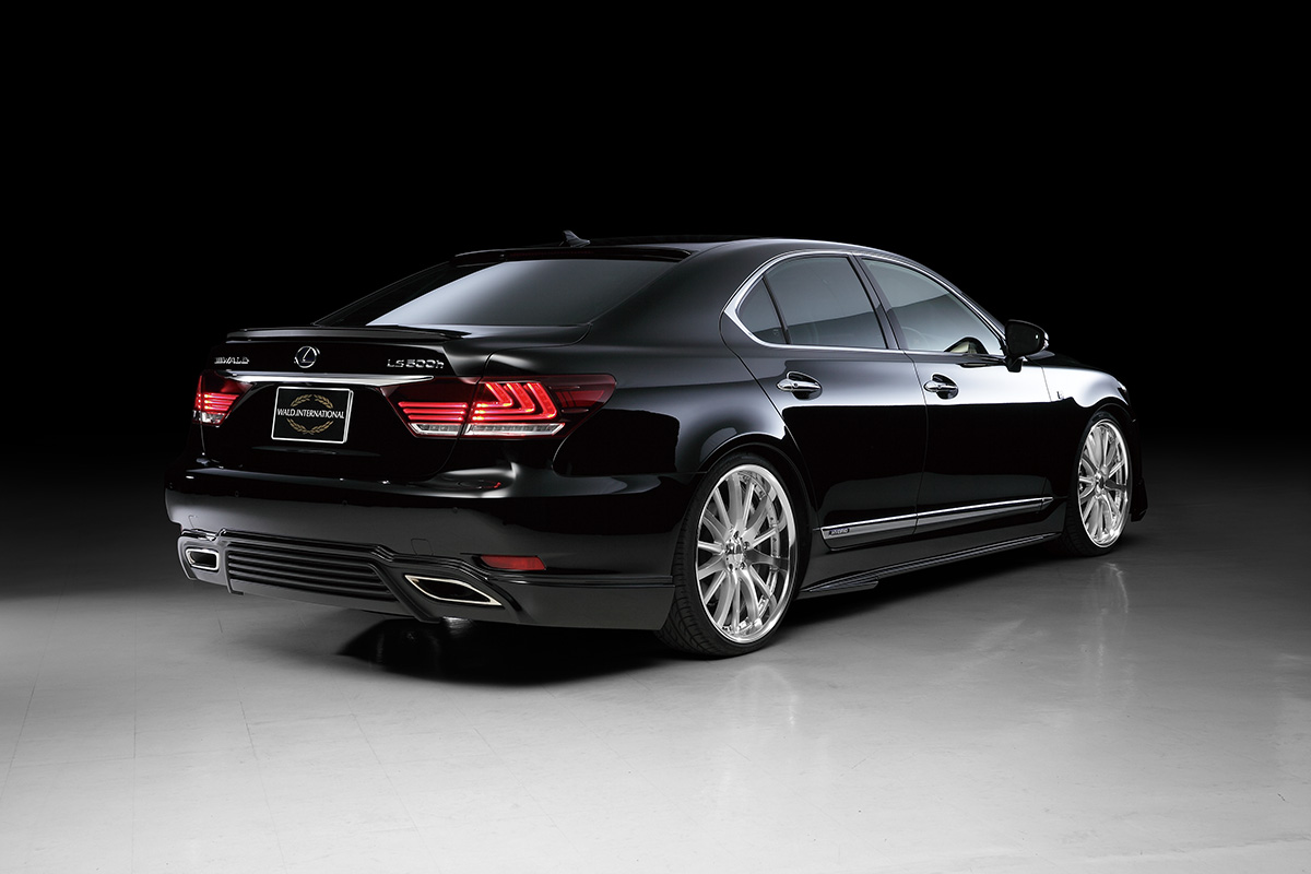 WALD Lexus LS600h F SPORT rear three-quarter studio view with WALD rear skirt and boot spoiler