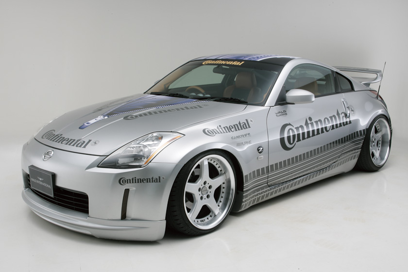 WALD Executive Line Nissan Fairlady Z Z33 — silver Z33 front three-quarter studio view with WALD front spoiler and side skirts