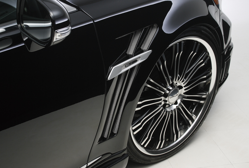 WALD Lexus LS600h sport fender duct with net and WALD plate beside a polished WALD wheel