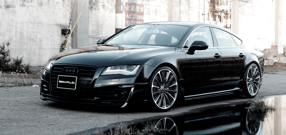 WALD Audi A7 Sportback body kit UK — black Audi A7 with WALD front bumper lip and multi-spoke WALD wheels