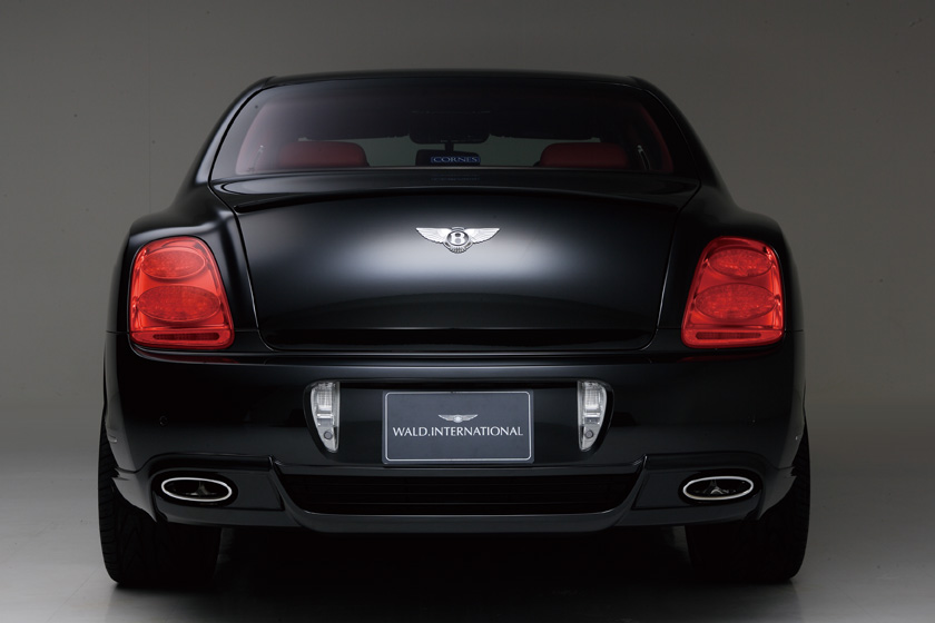 Bentley Continental Flying Spur Executive Line rear view with boot spoiler, tail lamps and twin oval exhaust mufflers