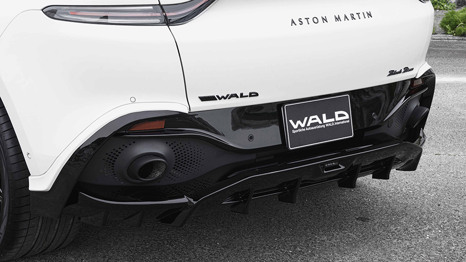 WALD Aston Martin DBX rear bumper detail — WALD rear bumper spoiler, diffuser fins and exhaust outlet