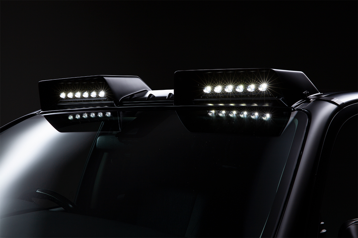 WALD Toyota Hilux GUN125 front roof spoiler with LEDHMLB1030 LED lamps illuminated