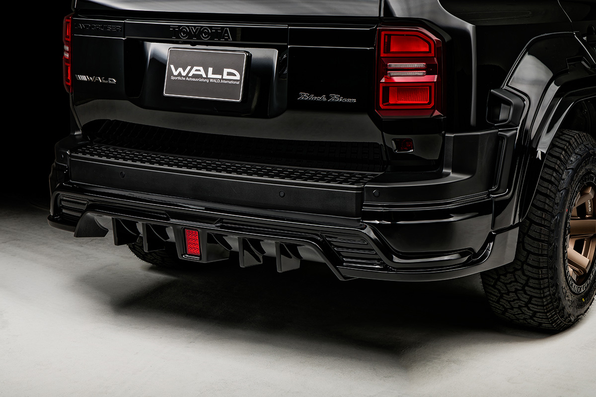 WALD Black Bison Land Cruiser 250 Prado rear skirt and diffuser detail with LED fog lamp