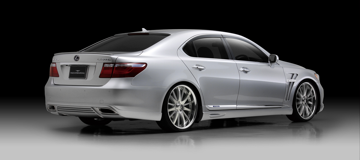 WALD Executive Line V2 Lexus LS600hL rear three-quarter studio view with WALD rear skirt and side skirts