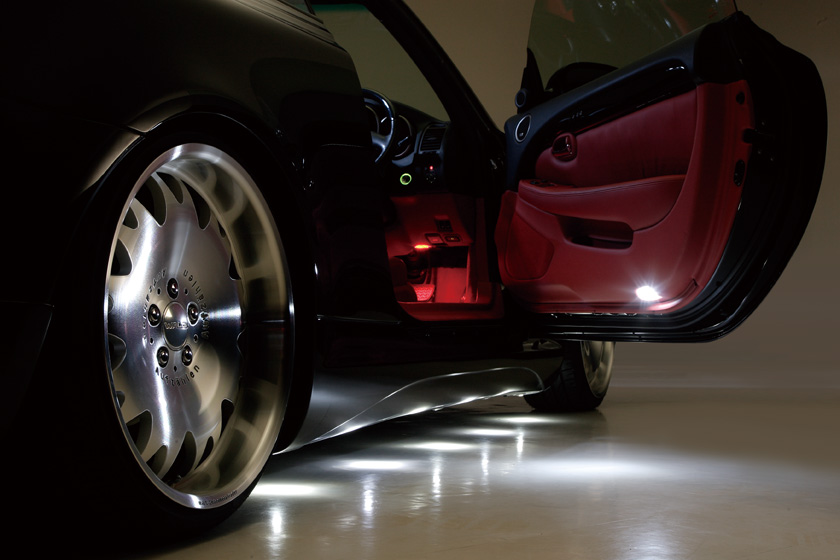 WALD Executive Line Lexus SC430 UZZ40 detail — side skirt, front wheel and WALD wheel design close-up